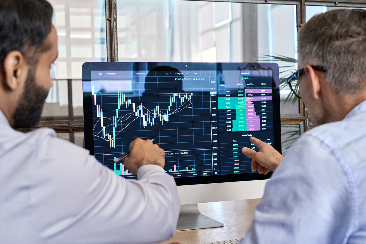 Traders Analyzing Crypto Charts